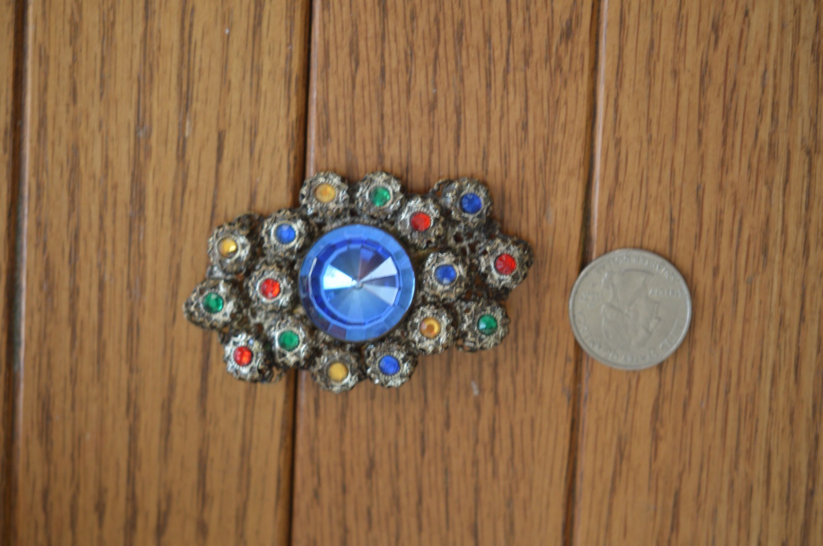 Gold Metal Brooch with Blue Round Glass Center and Multicolor Glass Stones